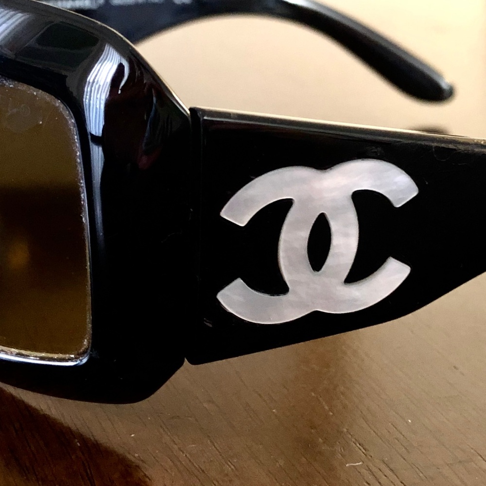9.	Chanel Sunglasses - black with mother of pearl